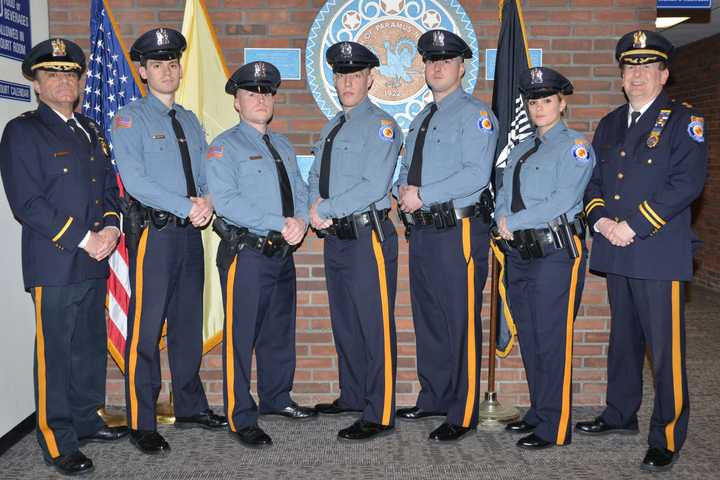 From left: Deputy Chief Robert Guidetti, Michael Focarino, Brian Doughty, William F. Stallone, Kevin Grady, Jamie Piccinich, Chief Kenneth Ehrenberg