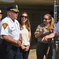 <p>Bridgeport Police Chief Armando Perez, left, and Mayor Joe Ganim, second from right, share a laugh with Chief Animal Control Officer Jennifer Wallace, left of Ganim.</p>