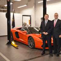 <p>Paramus Police Chief Kenneth Ehrenberg, Mayor Richard LaBarbiera and Deputy Police Chief Robert Guidetti admire a Lamborghini Aventador LP 700-4 Roadster hard-top convertible.</p>