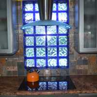 <p>One of five stained glass windows in LaMattina&#x27;s house is above the kitchen sink.</p>