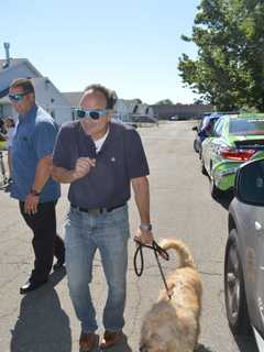 City Employees Volunteer To Make A Dog's Day In Bridgeport