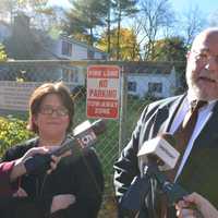 <p>Will Wedge, right, resumes his press conference on a nearby sidewalk after New Castle Police directed him to leave the grounds of the Chappaqua school district&#x27;s administrative building. Fellow parent Sandy Nohavicka is pictured at left.</p>