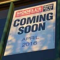 <p>A sign posted on behalf of Modell&#x27;s Sporting Goods at its future Mount Kisco location announces that it will open this coming April.</p>