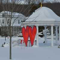 <p>Monroe&#x27;s Caitlin Loehr created the Valentine-themed artwork now on the Stepney Green in Monroe.</p>