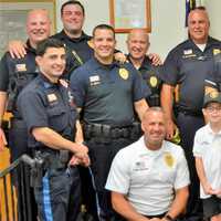 <p>BACK ROW: Officers Matt Martino, Glenn Howard, Sean Croal, Chris Bova, Sgt. Rocco Duardo, Lt. Mark Savino, Officers Steven Gildea, Kyle Cullen and Councilman Brian Downing. FRONT ROW: Chief Mazzeo, Chief Joey and Detective Randy Velez</p>