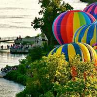 <p>Hot air balloons prepare to lift off during the 2014 festival.</p>