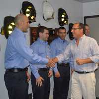 <p>Westport residents greet the new firefighters, (from left to right) Robert Wargo, Vincent Delvecchio, Andrew Ponteciello, Joshua Taylor and Francis Oldham.</p>