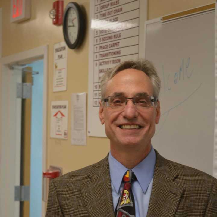 Dr. Steven M. Kant poses in a renovated room at the Boys &amp; Girls Village in Bridgeport on Tuesday afternoon. 