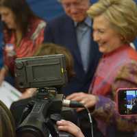 <p>An array of cameras surround Hillary Clinton as she makes a stop at her polling place in Chappaqua to vote in the Democratic presidential primary.</p>