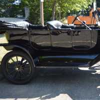 <p>Many vintage cars are lined up at the fourth annual car show at the Huntington Congregational Church in Shelton.</p>