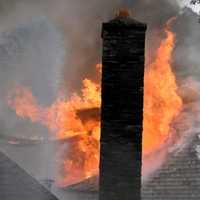 <p>Flames blew through the roof of the 99-year-old church.</p>