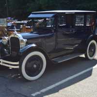 <p>Over 80 cars fill up the parking lot of the Huntington Congregational Church in Shelton.</p>