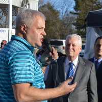 <p>Al DiGuido, owner of Saugatuck Sweets, officially opens the rink at Sherman Green.</p>