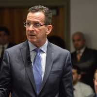 <p>Gov. Dannel Malloy addresses the audience in a town hall forum in Stamford Thursday evening.</p>