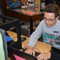 <p>Demetri Dassouras of Norwalk enjoys volunteering at Westport Library&#x27;s MakerSpace.</p>