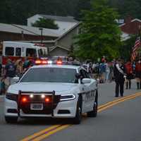 <p>A Carmel police car leads the Mahopac Volunteer Fire Department&#x27;s 2016 dress parade.</p>