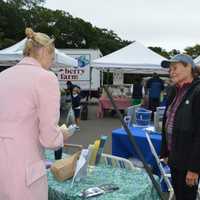 <p>Rindy Higgins, chair of the Westport Shellfish Commission, talked to Westport residents about their shellfishing opportunities in Long Island Sound at the Westport Farmers Market.</p>