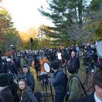 <p>Reporters and cameramen gather in a press pen in front of Chappaqua&#x27;s Douglas G. Grafflin Elementary School. The journalists gathered in anticipation of Hillary Clinton&#x27;s arrival to cast her presidential vote.</p>