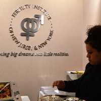 <p>A scene from the grand opening of the Fertility Institute of New Jersey and New York, whose motto is &quot;Turning big dreams into little realities.&quot;</p>