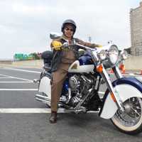 <p>Edgar Monroy has convinced commuters to hop on his motorcycle for a ride.</p>