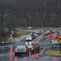 <p>Traffic stops at the Roaring Brook Road grade crossing in Chappaqua.</p>