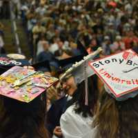 <p>Scores of Carmel High School's 2016 graduates attended commencement with mortarboard art.</p>