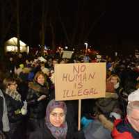 <p>Demonstrators at an interfaith vigil in Chappaqua, which protested President Donald Trump's ban on admitting refugees.</p>