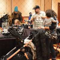 <p>The whole family turns out to shop at the craft fair.</p>