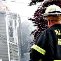 <p>Flames spread to a neighboring home, but firefighters limited the damage.</p>