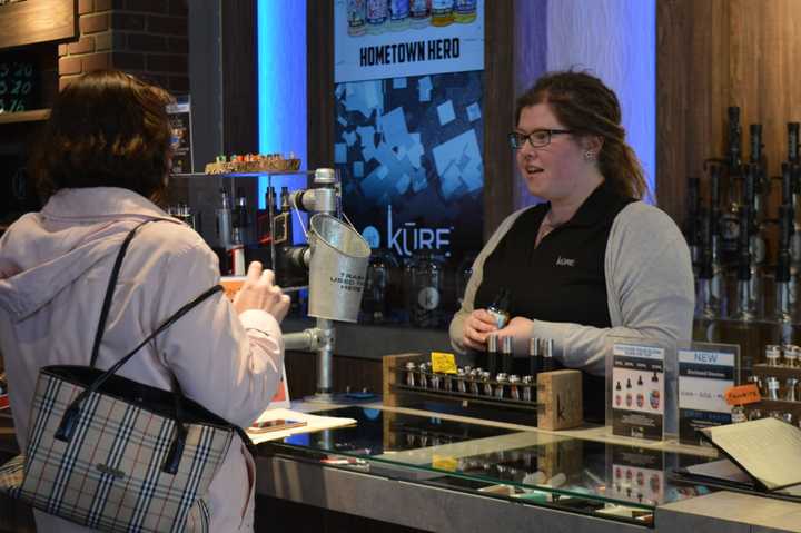 Kure General Manager Tasha Rocheleau talks to a customer at Bridgeport&#x27;s Kure.