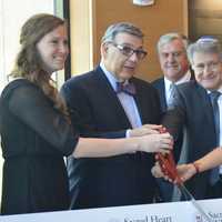 <p>Sophomore Class President Sarah Kosha, University President John Petillo, Rabbi Abraham Skorka and Resident Success Assistant Lauren Silver do the honors at a ribbon cutting at Sacred Heart University.</p>