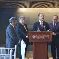 <p>Several local rabbis join Rabbi Abraham Skorka, second from left, in blessing Jorge Bergoglio Hall at Sacred Heart University in Fairfield.</p>