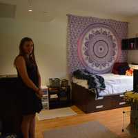 <p>Senior Lauren Silver shows off her room at Sacred Heart University&#x27;s new Jorge Bergoglio Hall.</p>