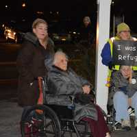 <p>Elderly attendees at an interfaith vigil in Chappaqua, which was held to protest President Donald Trump's ban on admitting refugees.</p>