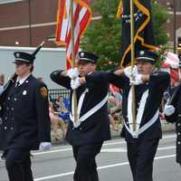 <p>Brewster firefighters march in the Mahopac Volunteer Fire Department&#x27;s dress parade.</p>