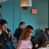 <p>A crowd of children and parents turn out for a &quot;Noon Year&#x27; celebration at the Maritime Aquarium in Norwalk on Thursday.</p>