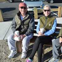 <p>Some in the crowd stay bundled up at the Polar Plunge.</p>