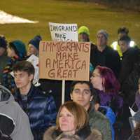 <p>Demonstrators at an interfaith vigil in Chappaqua protest President Donald Trump's ban on admitting refugees.</p>