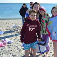 <p>All ages take the Polar Plunge for charity in Westport.</p>