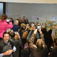 <p>A large crowd gathers in the auditorium/voting room at Douglas G. Grafflin Elementary School in Chappaqua to see Hillary and Bill Clinton cast their presidential votes.</p>