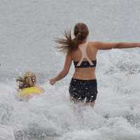 <p>A sizable contingent of swimmers brave the cold and took a plunge into Long Island Sound in Greenwich to celebrate the New Year on Friday afternoon.</p>