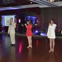 <p>The USO Show Troupe, which is also celebrating its 75th year, performs at the Hat City Ball.</p>