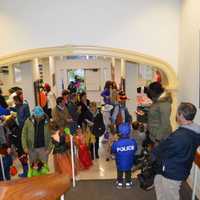 <p>Dozens of kids in costume, along with their parents, showed up on a rainy Thursday afternoon to Westport Town Hall to the annual Halloween trick-or-treat event.</p>