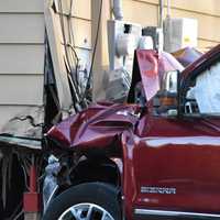 <p>The GMC Sierra plowed into the foundation and garage of the corner house on Bogle Avenue at River Road in North Arlington around 5 p.m. Monday, May 8.</p>