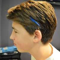 <p>Boys, too. Nick Santangelo, 14, sports his blue streak.</p>