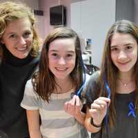 <p>Sporting their blue hair extensions at Industrie Hair Gurus in Ridgewood are, from the left, Sandy Santangelo, mom; Samantha Santangelo, 12; Rebecca Kaye, 12, and Ella Dusci, 12.</p>