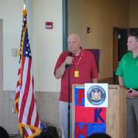 <p>Treptow speaking to students alongside Senator Murphy.</p>