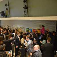 <p>A large crowd gathers in the auditorium/voting room at Douglas G. Grafflin Elementary School in Chappaqua to see Hillary and Bill Clinton cast their presidential votes.</p>