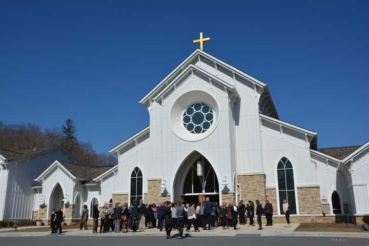 Mourners leave St. Joseph&#x27;s Church in Somers following a memorial service for Sister Barbara Heil.