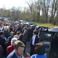 <p>A large group of supporters surrounds Hillary and Bill Clinton after the two voted at their Chappaqua polling place.</p>